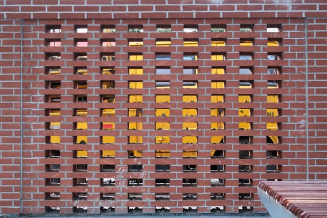 Behind the wall